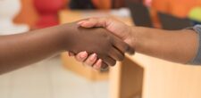 Two People Shaking Hands