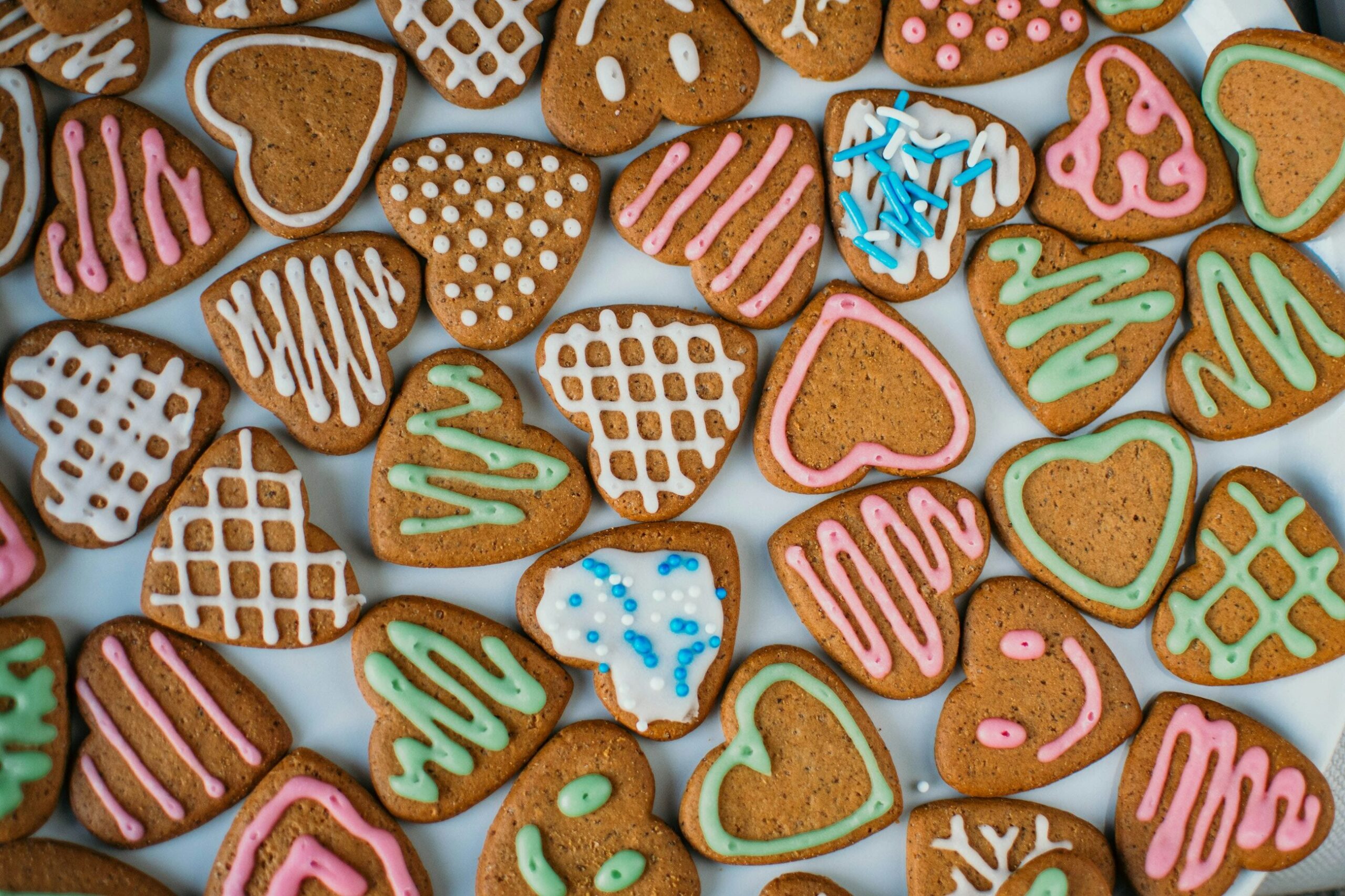 a white plate topped with lots of cookies